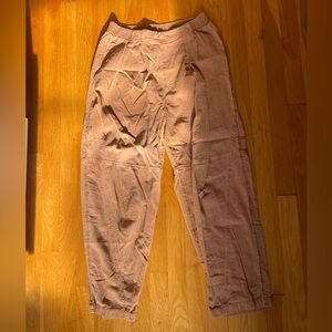 Out from under Brown Pants